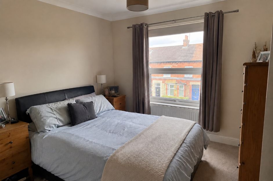 A neutral bedroom before redesign