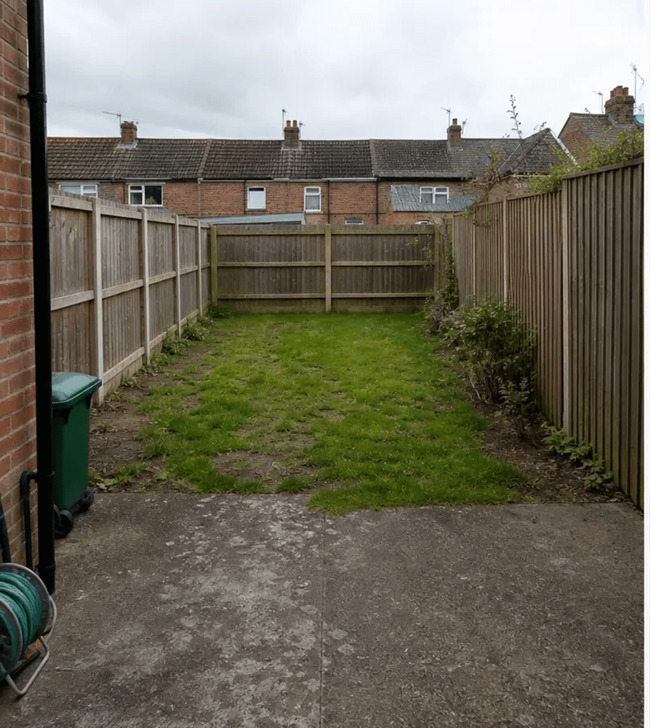 A modest terraced-house back garden before landscaping